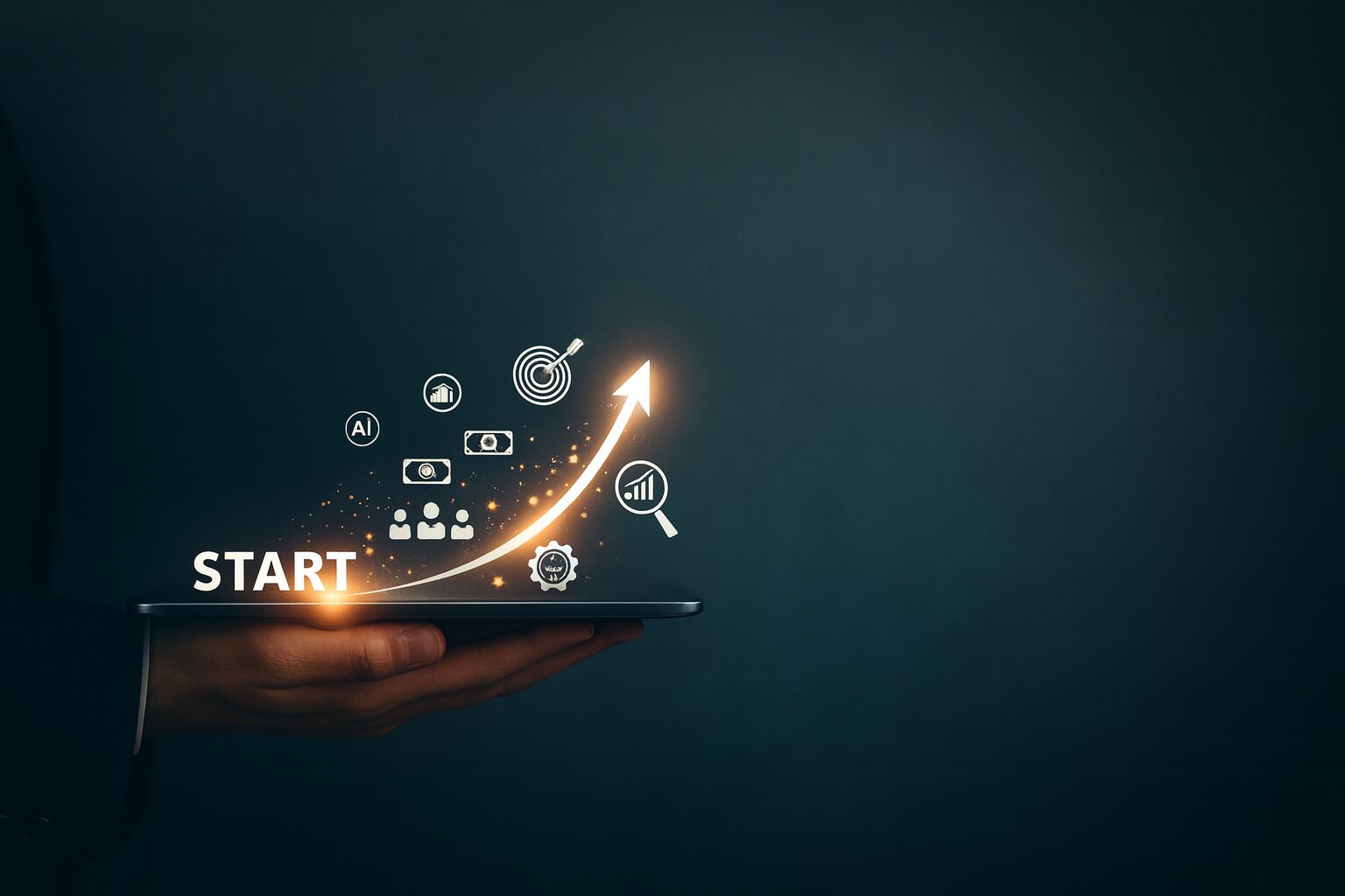 Hand holding a tablet with the word START and glowing arrow of business icons rising upward on a dark background.