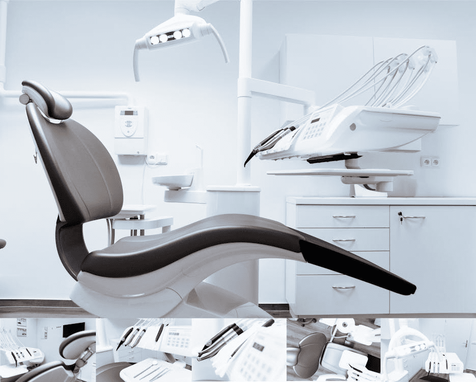 Modern dental treatment room with reclining chair, overhead light, instrument tray and cabinets in clean white setting.